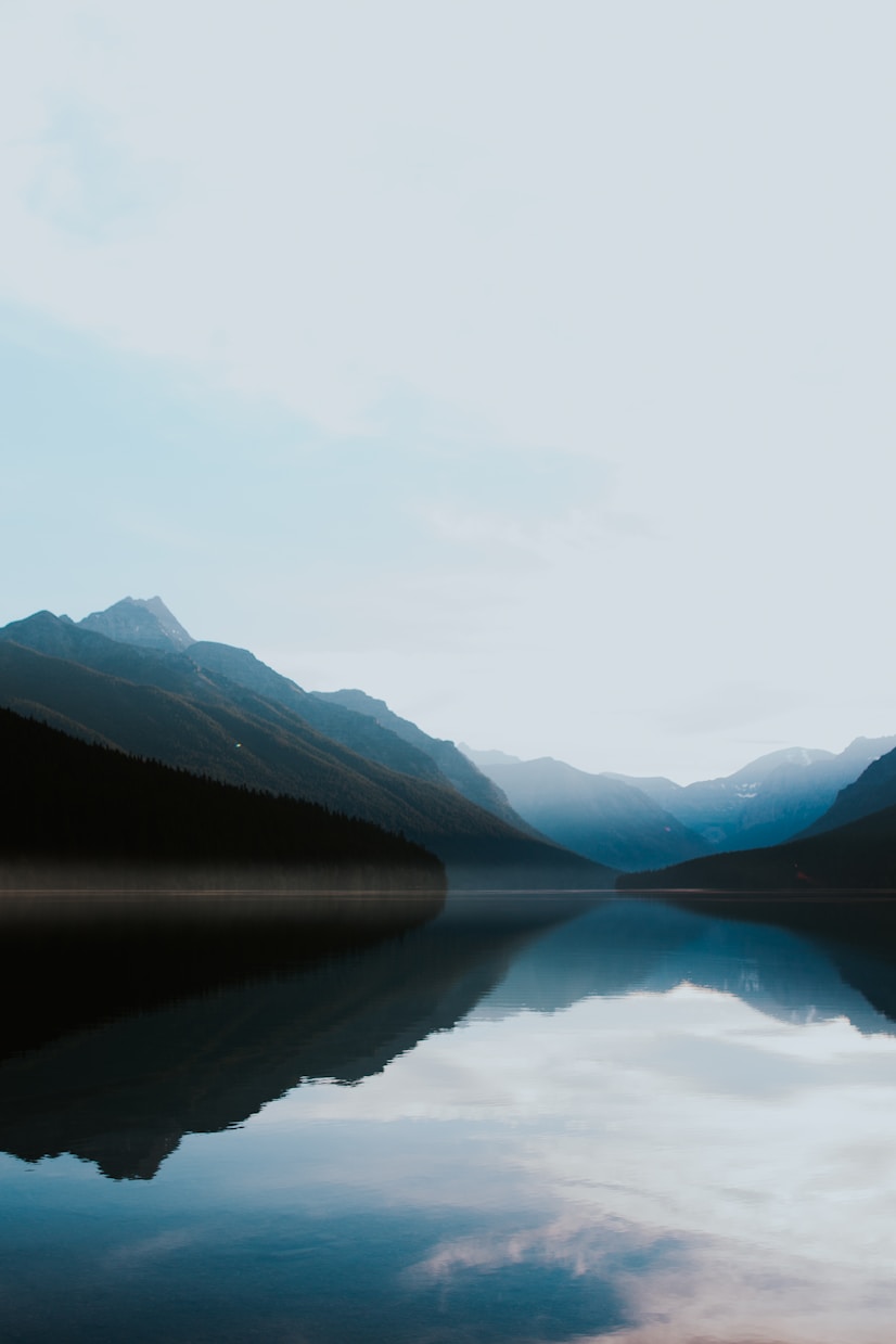 Mountain landscape reflected in calm lake